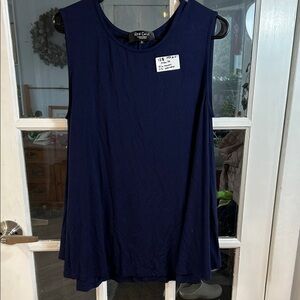 B33.    Women's Navy Sleeveless Swing Top